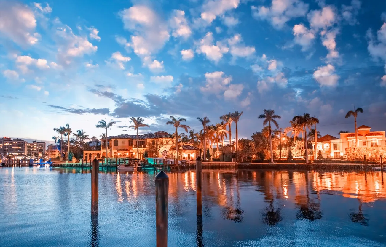 Boca Raton buildings along Lake Boca Raton at sunset, Florida
